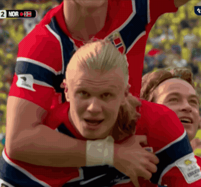 Man With Ponytail In Blue Sky Shirt GIF