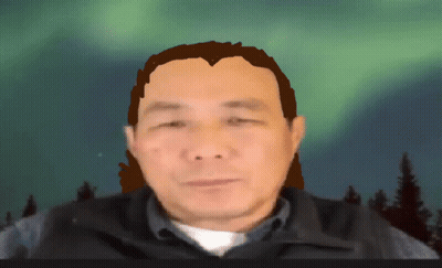 Man With Ponytail In Front Of Northern Lights GIF