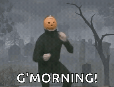 Man With Pumpkin Head In Cemetery Says G Morning GIF