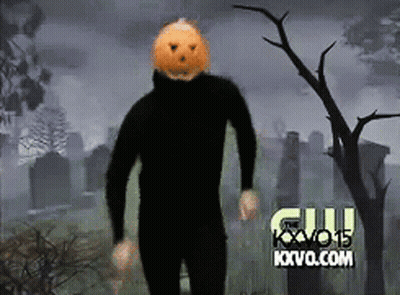 Man With Pumpkin On Head In Cemetery Sponsored By Kvvo.com GIF