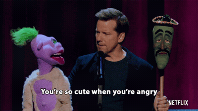 Man With Purple And Green Puppets And Sombrero GIF