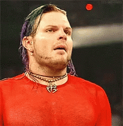Man With Purple Hair In Red Shirt And Choker GIF