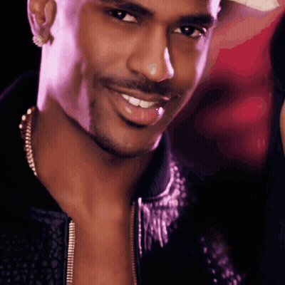 Man With Purple Light Behind GIF
