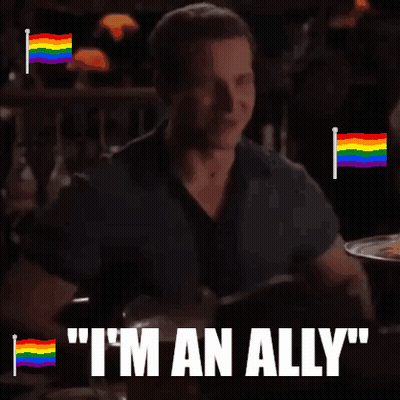 Man With Rainbow Flags Says I'm An Ally GIF