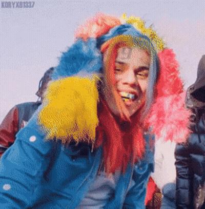 Man With Rainbow Hair Smiling GIF