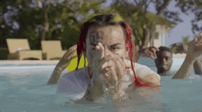Man With Rainbow Umbrella Saying Im Back GIF