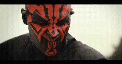 Man With Red And Black Face Paint And M GIF