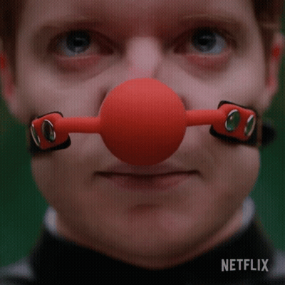 Man With Red Ball Gag On Nose And Netflix GIF