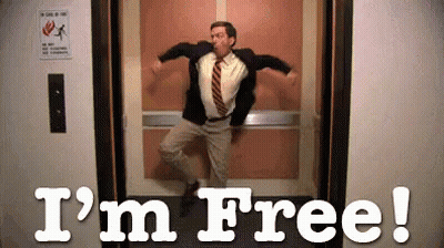 Man With Red Clown Nose And Pink Jacket Raising Arm GIF