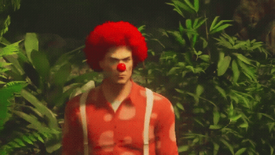 Man With Red Clown Nose And Red Afro GIF
