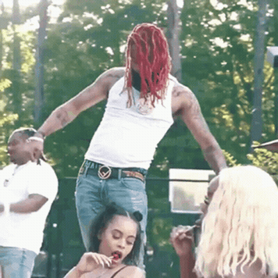 Man With Red Dreadlocks Standing On Woman's Lap GIF