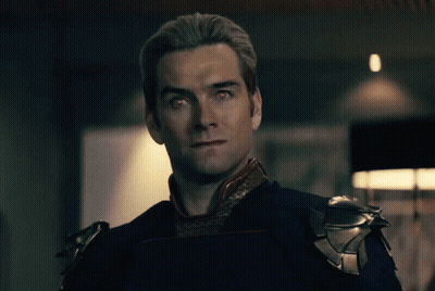 Man With Red Eyes And Shoulder Armor GIF