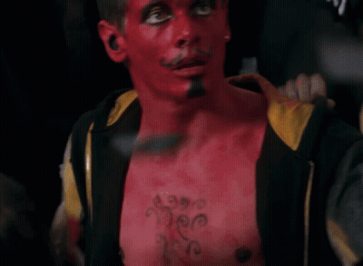 Man With Red Face Paint And I Love You Chest Tattoo GIF