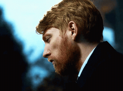 Man With Red Hair And Beard Looking Down GIF