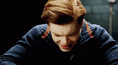 Man With Red Hair And Blue Sweater Smiles GIF