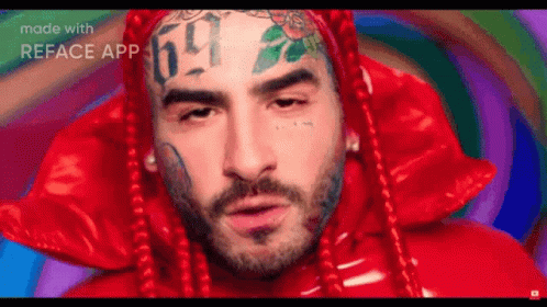 Man With Red Hair And Tattoo On Face GIF
