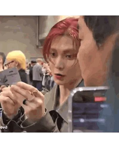 Man With Red Hair Holding Card Sticker