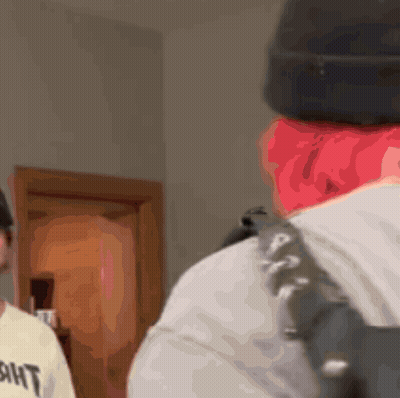 Man With Red Hair In Black Beanie Wearing Ant Shirt GIF