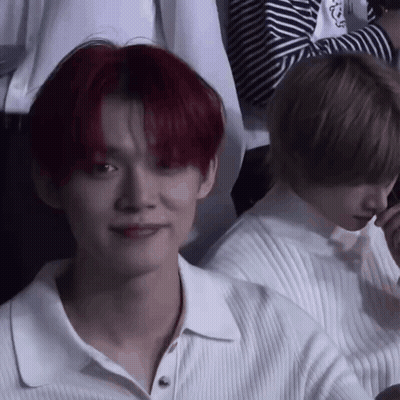 Man With Red Hair Sitting Next To Another Man GIF