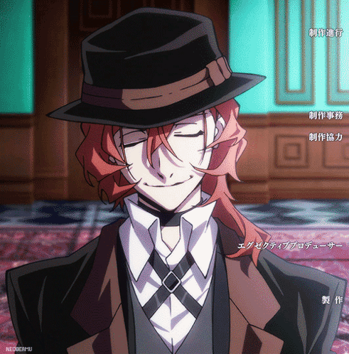 Man With Red Hair Wearing Hat And Vest With Chinese Writing GIF