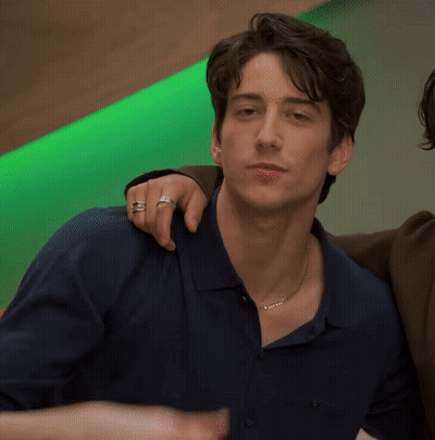 Man With Ring Beside Another Man GIF