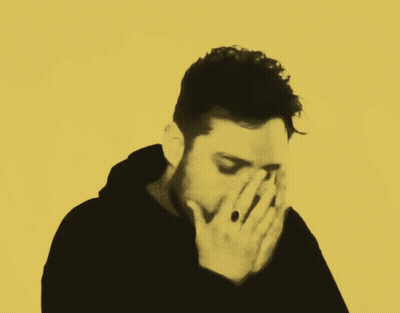 Man With Ring Covering Face GIF