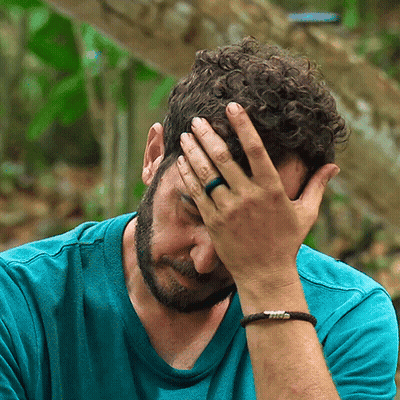 Man With Ring Covering Face GIF