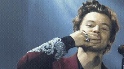 Man With Ring Covering Mouth GIF