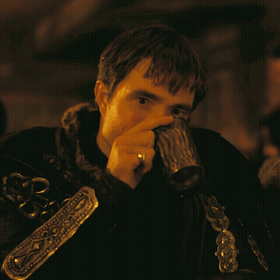 Man With Ring Drinking From Silver Mug GIF