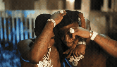 Man With Ring Holding Another's Head GIF