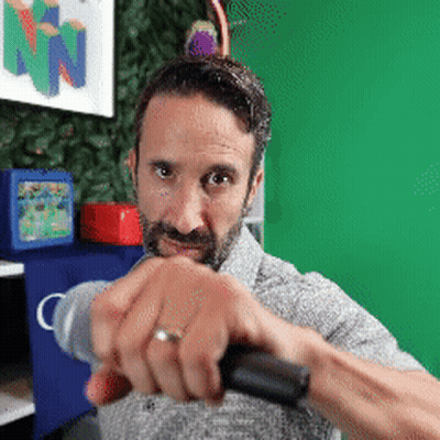 Man With Ring Holding Microphone GIF