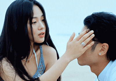 Man With Ring Kissing Woman GIF