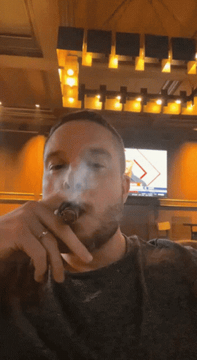 Man With Ring Smoking Cigar GIF