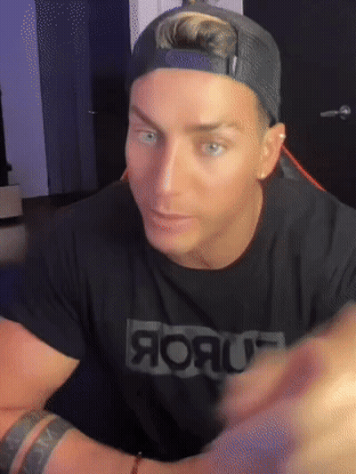 Man With Robloxia Avatar On Head GIF