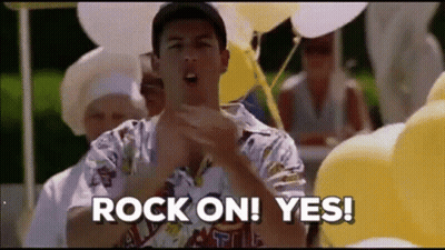 Man With Rock On Yes Sign And Balloons GIF