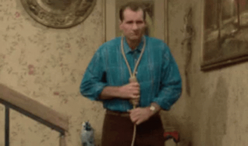 Man With Rope Around Neck On Stairs GIF