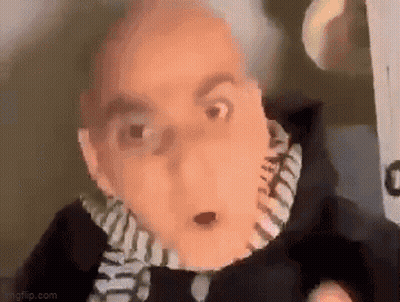 Man With Scarf And Surprised Look GIF