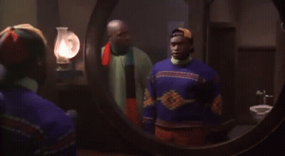 Man With Scarf Talking To Another Man GIF
