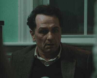Man With Serious Expression GIF