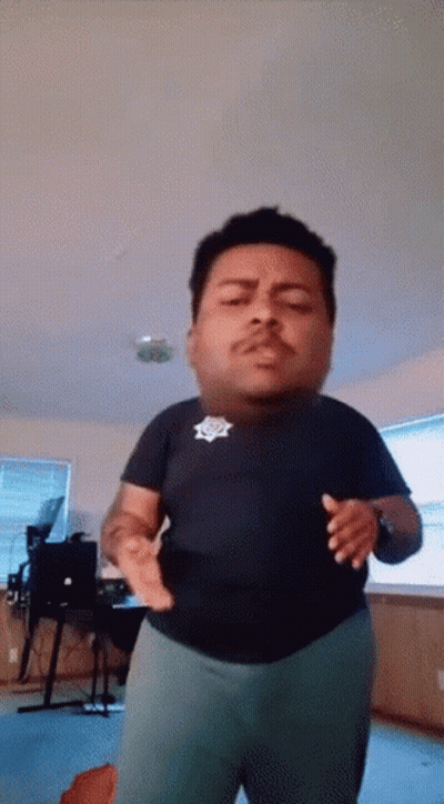 Man With Sheriff's Badge Dancing GIF