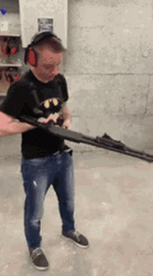 Man With Shotgun Aiming For Accuracy GIF