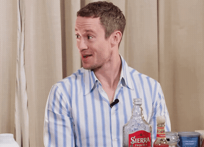 Man With Sierra Tequila Bottle Behind Him GIF