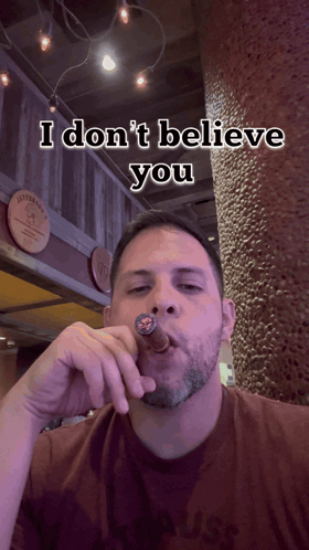Man With Sign Saying Mc A Good Loser GIF
