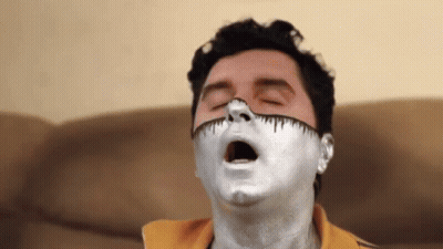 Man With Silver Paint On Face Eyes Closed GIF