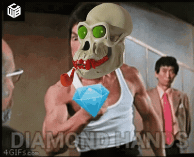 Man With Skull On Head Holding Diamond GIF