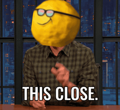 Man With Smiley Face On Head This Close GIF