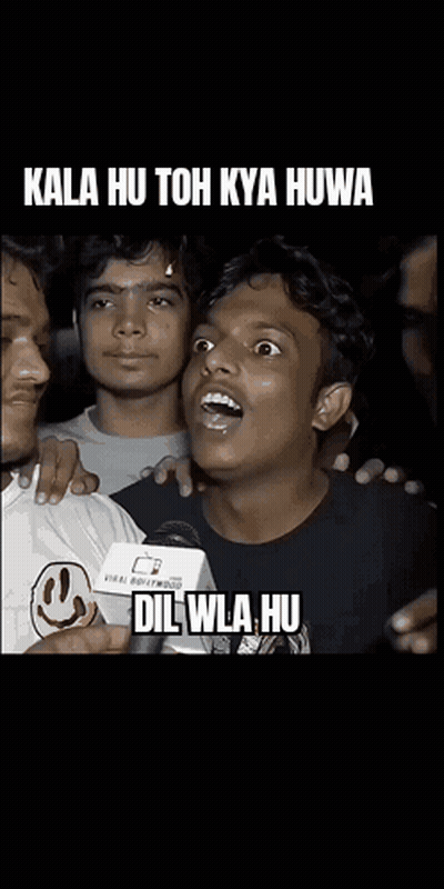 Man With Smiley Shirt Saying Kala Hu Toh Kya Huwa Dil Wala Hu GIF