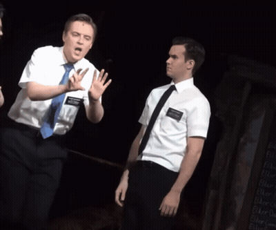 Man With Smith Name Tag On Stage GIF