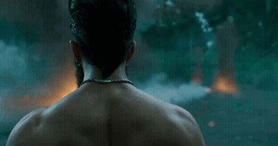 Man With Snake Around Neck Looking GIF