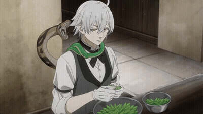 Man With Snake Around Neck Preparing Food GIF